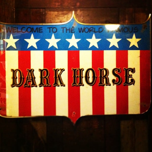 Photo taken at World Famous Dark Horse Bar &amp; Grill by Eric M. on 12/27/2012