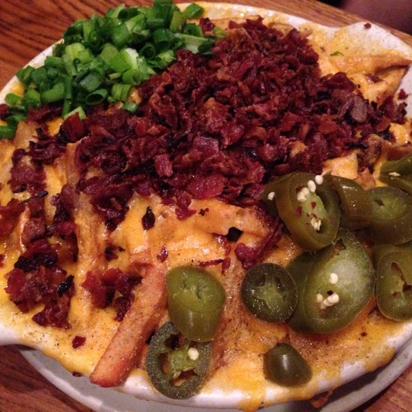 Photo taken at Snuffers by Gabriel G. on 5/22/2014