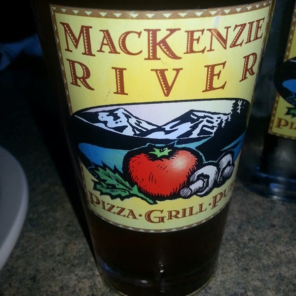 Photo taken at Mackenzie River Pizza, Grill, and Pub by Ana B. on 7/12/2013