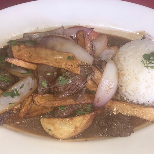 Photo taken at Emelina&#39;s Peruvian Restaurant by Jules C. on 5/5/2019