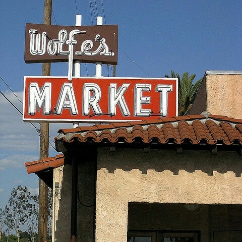 Photo taken at Wolfe&#39;s Market by pedro g. on 7/7/2012