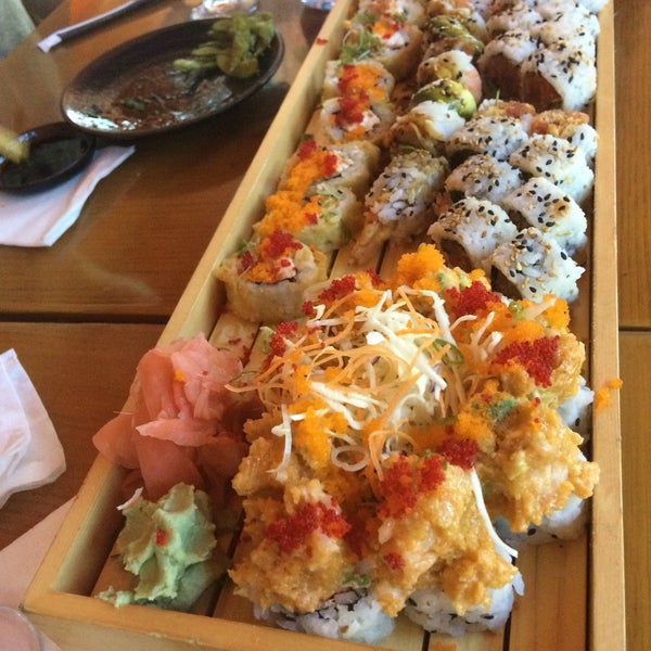 Photo taken at Yoshis Sushi &amp; Grill by Stacey S. on 8/9/2016
