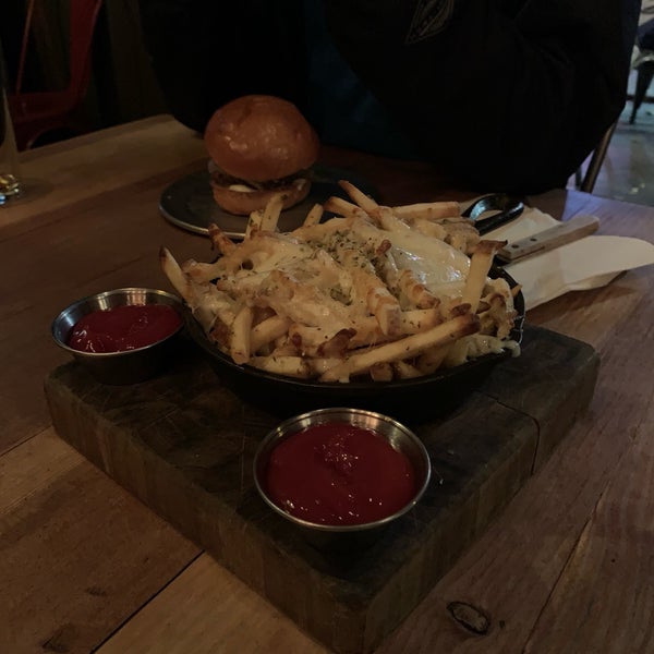 Photo taken at Stout Burgers &amp; Beers by Mansour on 12/1/2018