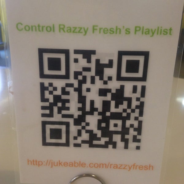 You have the option to control the music playing in the store! Just scan a QR code that are on all the tables.