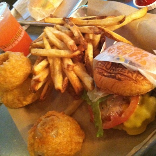 Photo taken at BurgerFi by Tamra H. on 10/1/2012