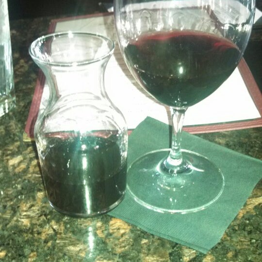 Photo taken at D&#39;Vine Bistro &amp; Wine Bar by Alicia V. on 5/3/2014