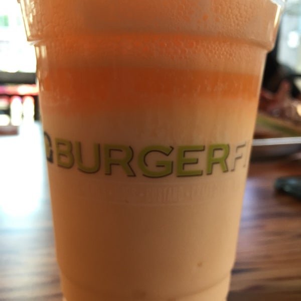 Photo taken at BurgerFi by ian on 9/27/2014