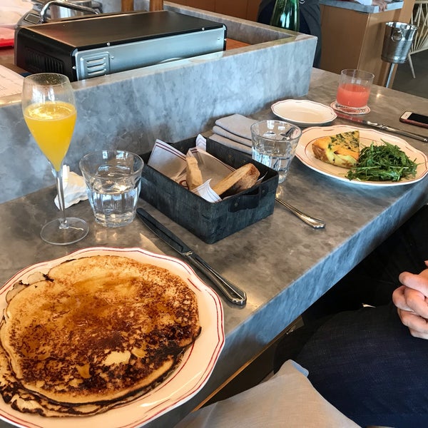 Ricotta pancake was dreamy! Amazing mimosas. Interior design is neat and modern. Spot on. One of the bests in the area.