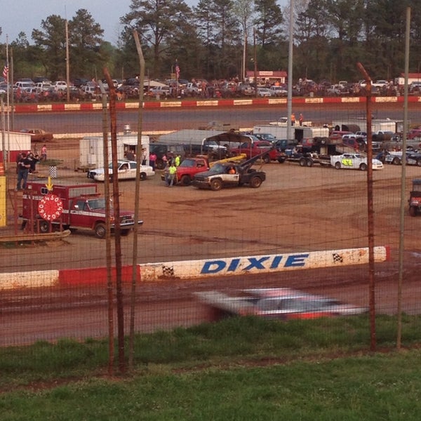 Photo taken at Dixie Speedway Home of the Champions by Olivia M. on 4/12/2014