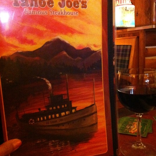 Photo taken at Tahoe Joe&#39;s by Tracy S. on 3/15/2013