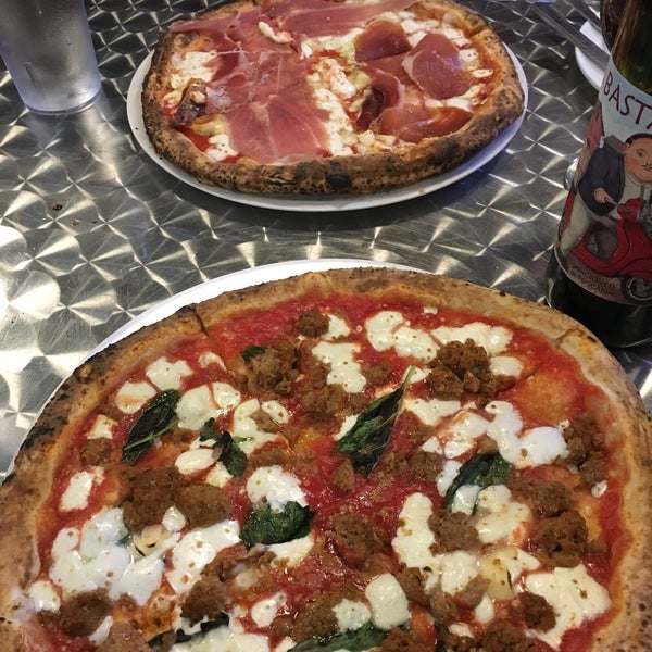 Fantastic Italian-style pizza! We love the meatball pizza and the prosciutto and arugula. The arancini are good too!