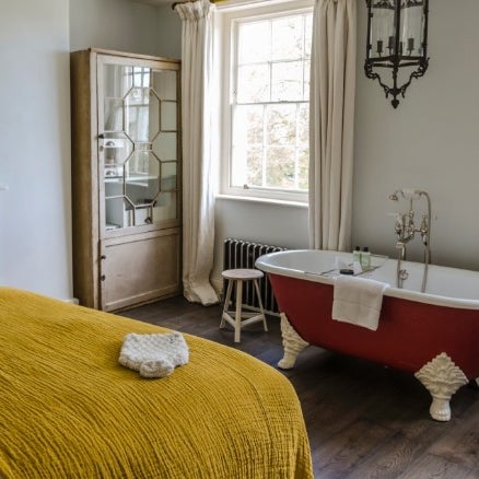 The brainchild of Sam and Georgie Pearman, this Regency building has 13 bedrooms, elegantly done with reclaimed-wood tables, freestanding Victorian bathtubs and David Hockney prints.