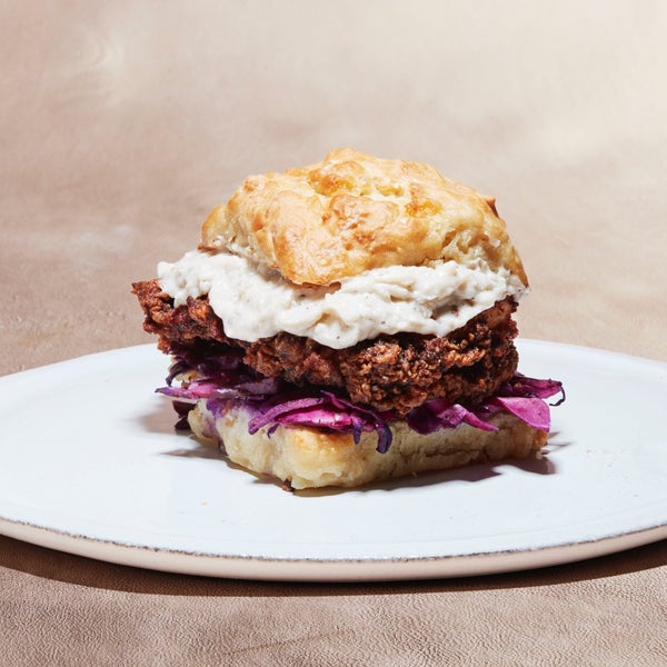 Jeremiah Stone, chef/co-owner of Contra, recommends the Fried Chicken and Biscuit sandwich.
