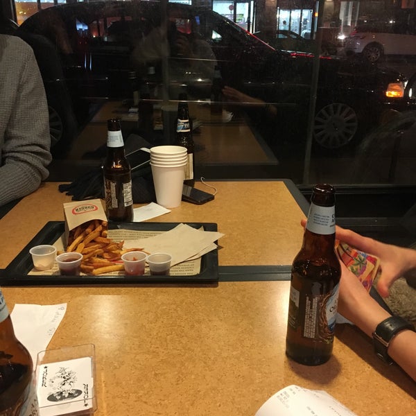 Photo taken at New York Burger Co. by Maryna B. on 1/14/2018