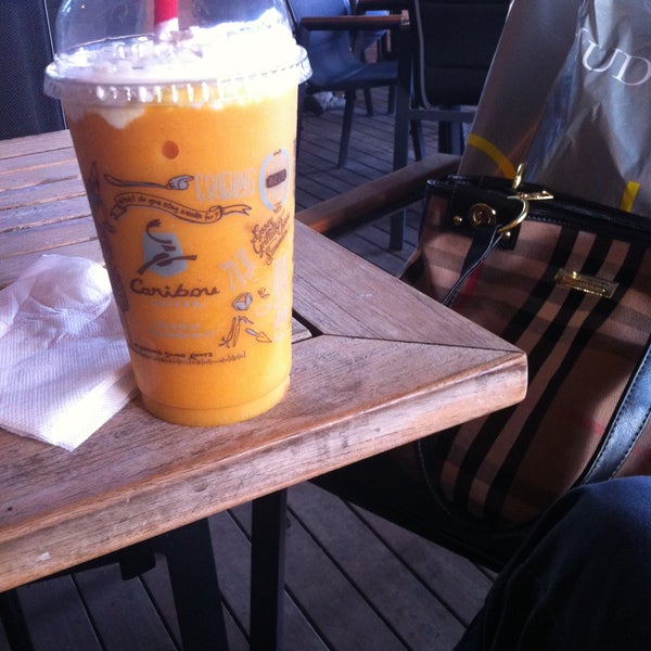 Photo taken at Caribou Coffee by Nihan Y. on 5/16/2013