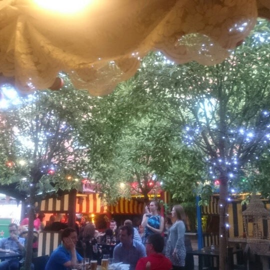 backyard with colourful booths, music and bbq nights in the summer.Nice atmosphere, not very noisy for a pub. Hand-cut chips that came with the burger were amazing.