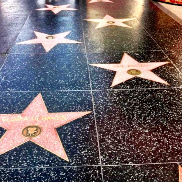 Photo taken at Hollywood Walk of Fame by Gokhan M. on 5/2/2013