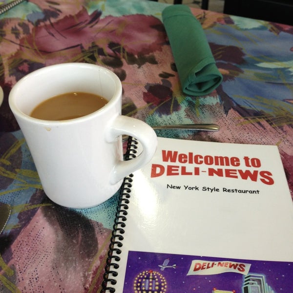 Photo taken at Deli News by Beau R. on 12/24/2012