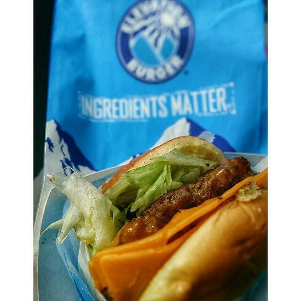 Photo taken at Elevation Burger by Foodivores R. on 10/11/2015