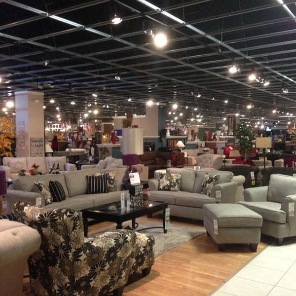 Photo taken at American Furniture Warehouse by Eric H. on 6/18/2013