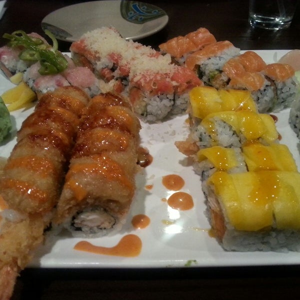 Photo taken at Sushi Kingdom by Jaimie V. on 3/19/2014
