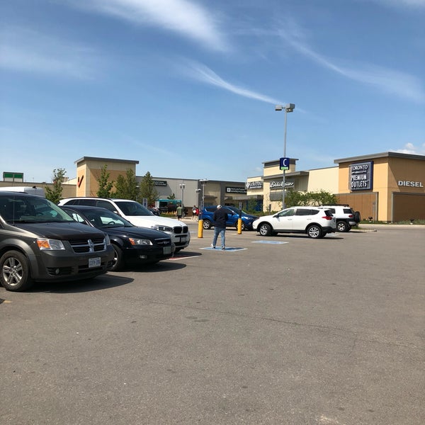 Photo taken at Toronto Premium Outlets by Lucy T. on 6/8/2018