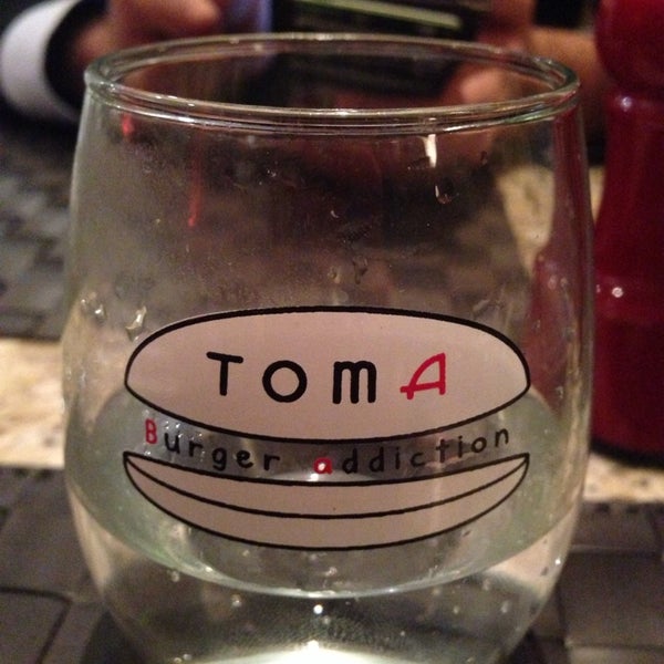 Photo taken at Toma Burger Addiction by Michael B. on 12/8/2013