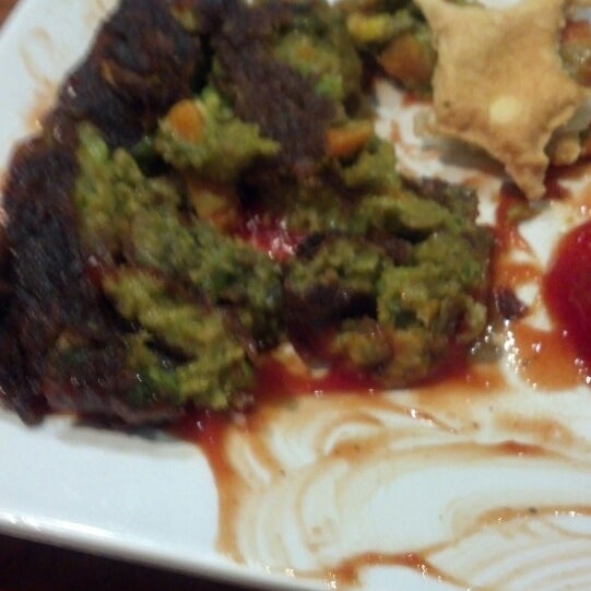 Veggie Patty is a green mush. They seriously pureed carrots and peas and burnt the outside to Make it look brown.