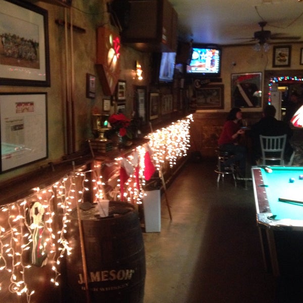 Photo taken at Finn McCool&#39;s Irish Pub by Kira H. on 12/20/2015