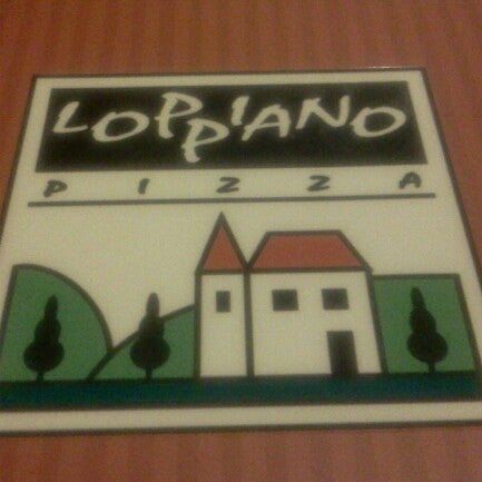 Photo taken at Loppiano Pizza by Douglas C. on 12/26/2012
