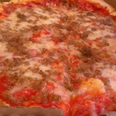 Photo taken at Joe&#39;s New York Pizza by Michael C. on 12/14/2012