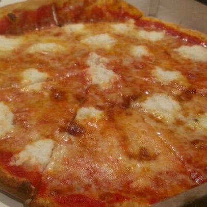 Photo taken at Joe&#39;s New York Pizza by Michael C. on 12/6/2012