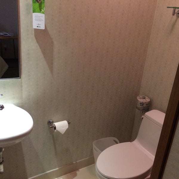 Who thought it was a good idea to put a bathroom out of a cruise ship in this hotel.  The benefit is you can wash your hands or brush your teeth while sitting on the toilet.