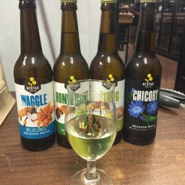 Photo taken at Bine &amp; Vine Bottle Shop by Gregory H. on 4/29/2015