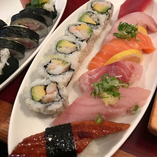 Photo taken at Sushi Zone by Eric P. on 9/2/2018