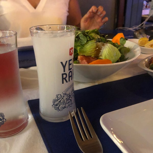 Photo taken at Mavi Balık&amp;Meze Restaurant by Nur H. on 10/26/2019
