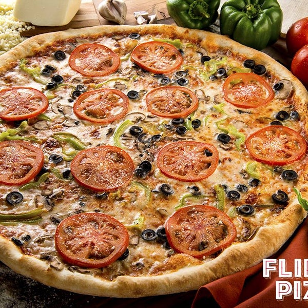 Foto diambil di Flippin&#39; Pizza oleh Flippin&#39; Pizza pada 10/30/2015