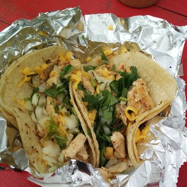 Photo taken at Art of Tacos by Jonathan G. on 3/7/2014