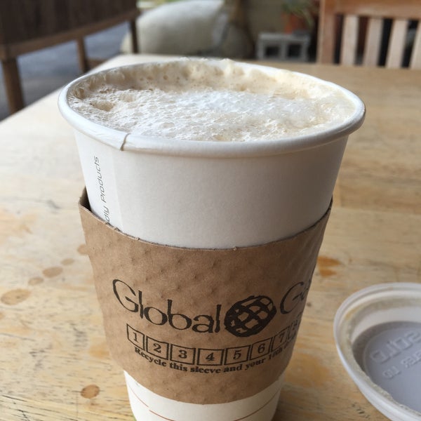 Photo taken at Global Gallery Fair Trade Coffee Shop by Melissa K. on 12/6/2015