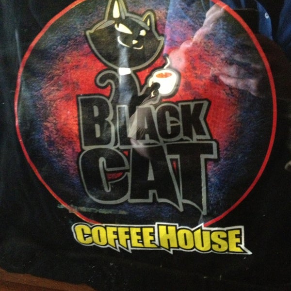 Photo taken at Black Cat Coffee House by Cody H. on 4/8/2013