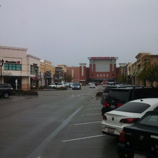Photo taken at Mayfaire Town Center by John S. on 4/4/2013