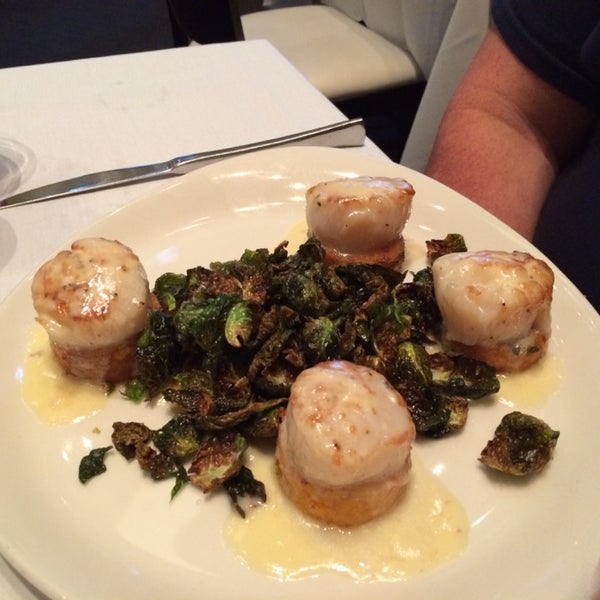 Scallops are amazing on a mini polenta cake and crispy Brussel sprouts. Niman Ranch strip steak was incredible, too.