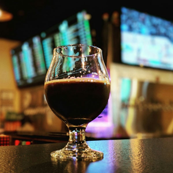 Photo taken at Westside Taphouse &amp; Growler Fill by Tristan P. on 3/8/2018