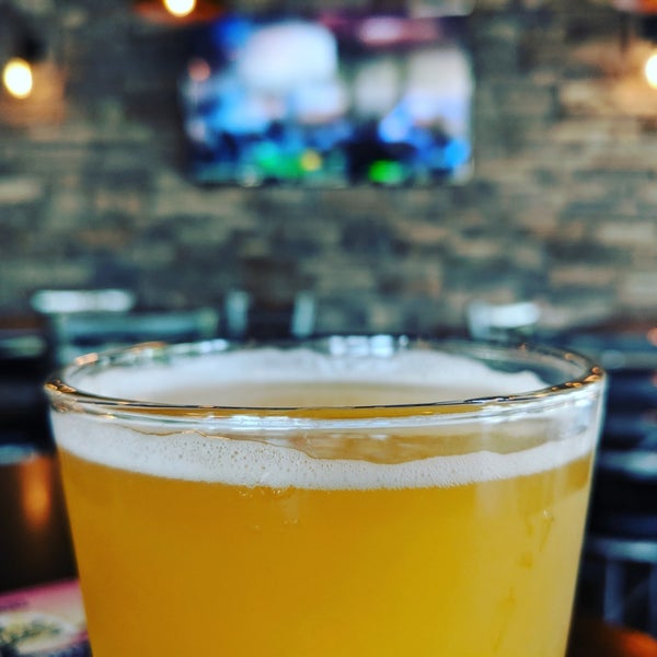 Photo taken at Westside Taphouse &amp; Growler Fill by Tristan P. on 5/12/2019