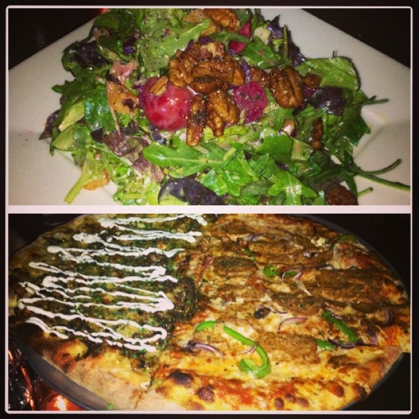 Photo taken at American Flatbread Tribeca Hearth by Kasey T. on 2/24/2013