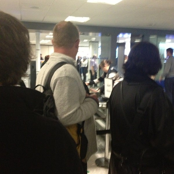 Photo taken at Security Check by Jamie B. on 5/27/2013