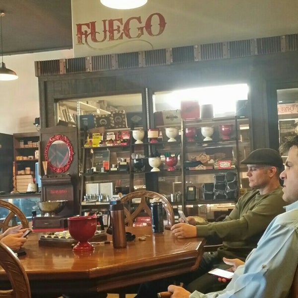 Photo taken at En Fuego Cigars &amp; Lounge by Wes G. on 11/7/2014