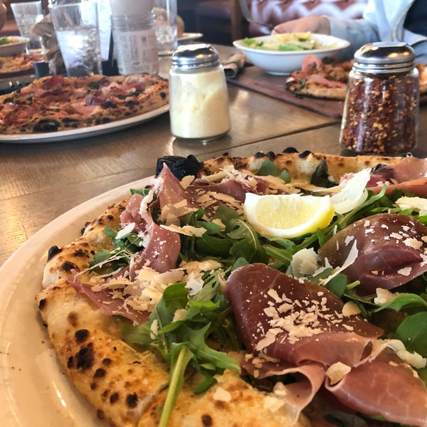 Get the prosciutto and arugula. Ask for some chili oil and drizzle it all over.