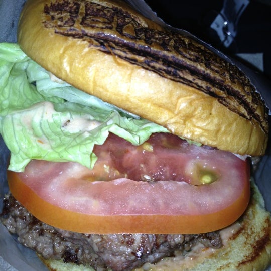 Photo taken at BurgerFi by Lucia D. on 12/18/2012