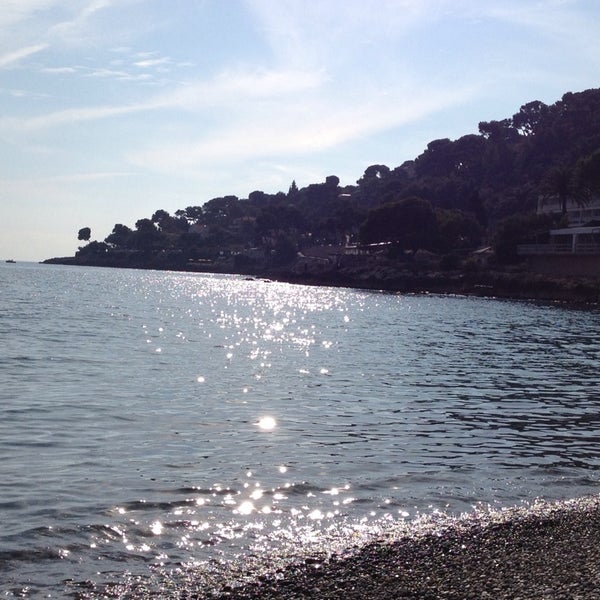 Photo taken at Plage de Roquebrune Cap Martin by Eugenia M. on 11/2/2014